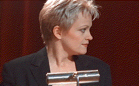 a screenshot from the film. it is a closeup of the narrator at a podium. she is looking to the side nervously.